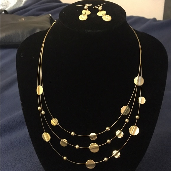 Gold necklace and earrings