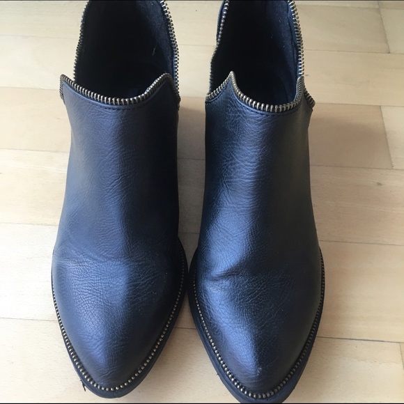 Black leather booties with zipper detail