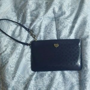 Deep purple Coach wristlet