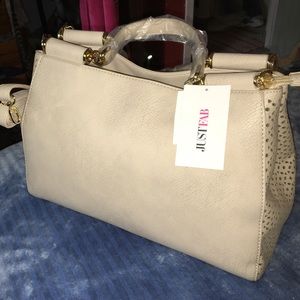 Cream colored purse 👝