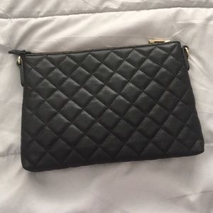 Quilted black clutch