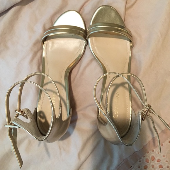 Calvin Klein gold wedge size 6.5