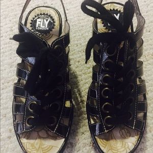 Lace up wedge sandals. Fly London.