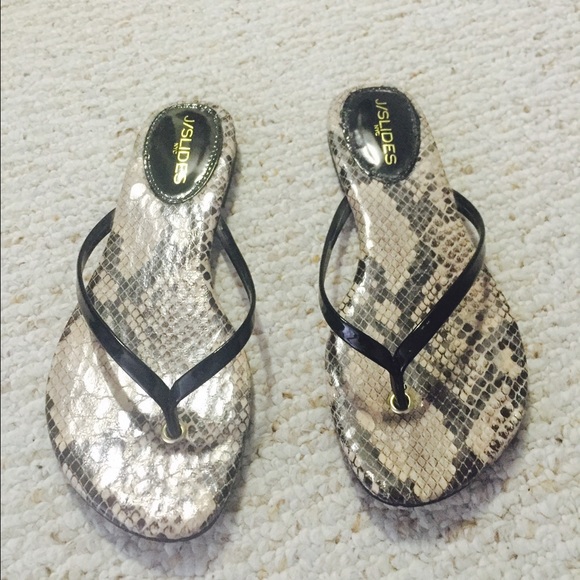 Black patent leather thing sandals.