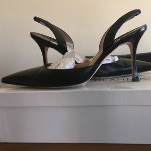 Manolo Blahnick black 2" sling back heels.