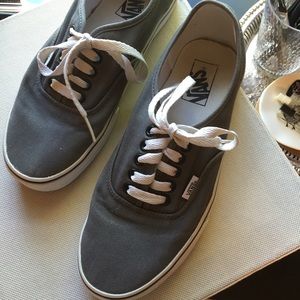 Grey Vans with white soles