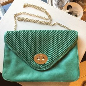 Green clutch with fun textured detail
