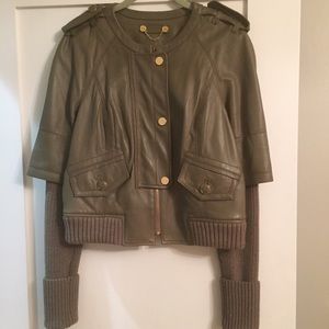 Army green leather jacket with sweater sleeves
