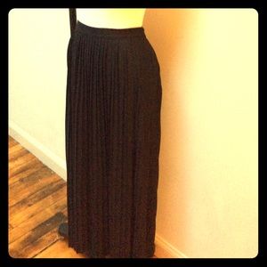 Pleated long black Zara skirt.