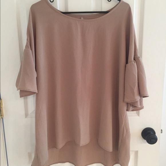 Fun and flirty tan top