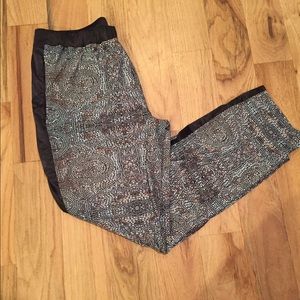 Lululemon Black "Rise and Shine Trouser" pants.