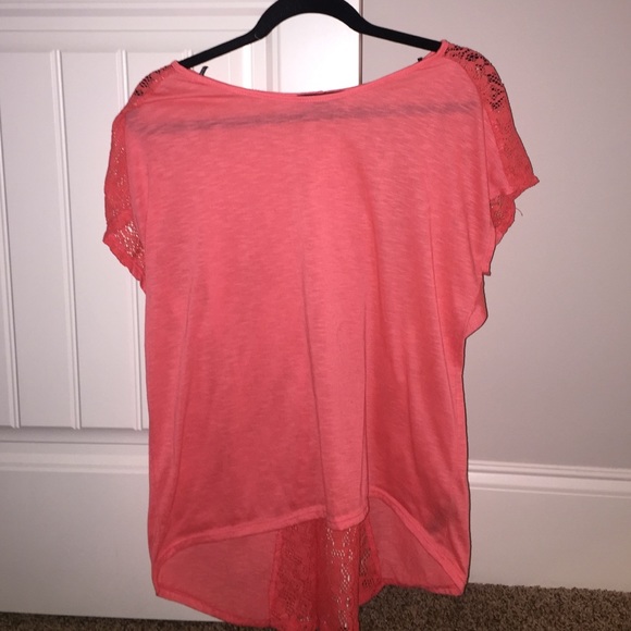 Coral top with lace design on the back