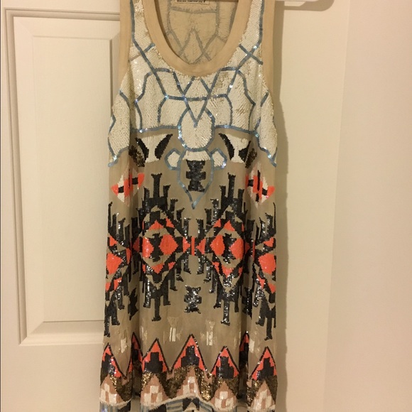 Hand beaded dress from All Saints. No trades