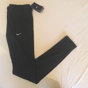 NWT Nike Essential tights w/zipper and mesh. Sz S