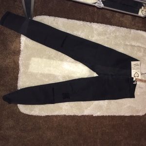 Charcoal skinny jeans with holes in need brand new