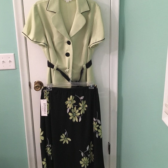 Two piece suit. Skirt and top.