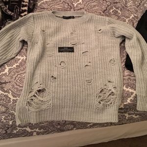 Sweater with tags