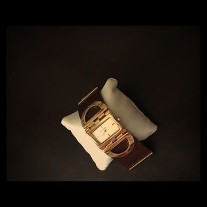 Jessica Simpson gold tone leather band watch