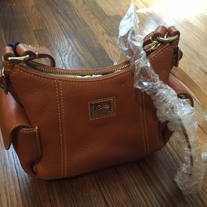 Dooney and Bourke pocket sac crossbody small. NWT