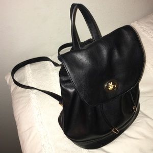 Black purse backpack