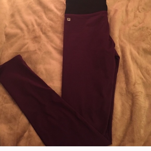 Plum workout leggings being held!