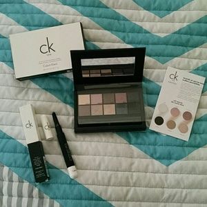 Calvin Klein eyeshadow kit and brow pencil