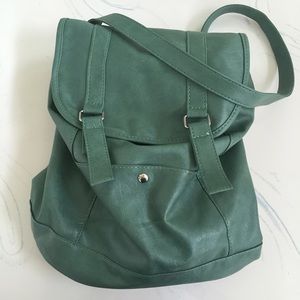 Green faux leather backpack