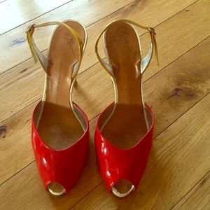 Giuseppe Zanotti. Red patent leather slingback.