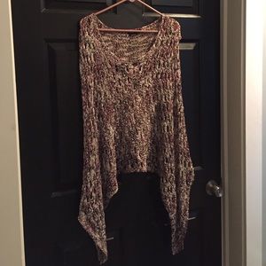 Crochet sleeveless poncho.