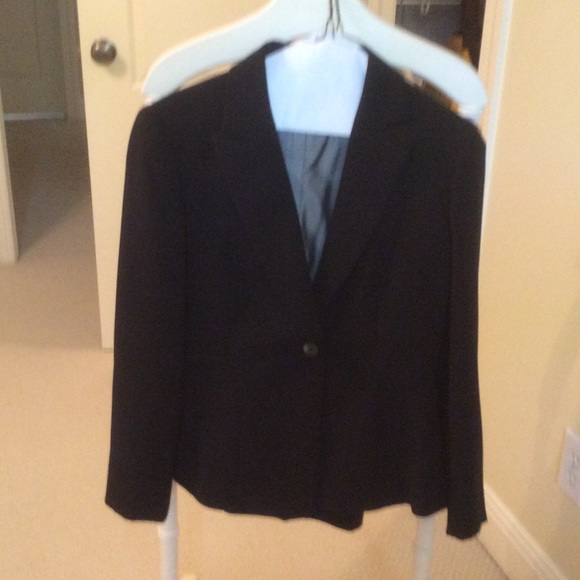 Tahari black pant suit.