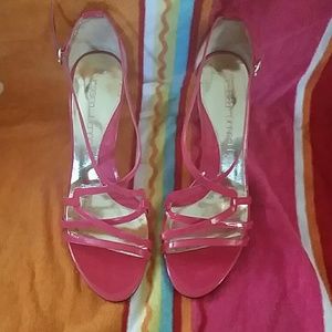Pink patent heel.