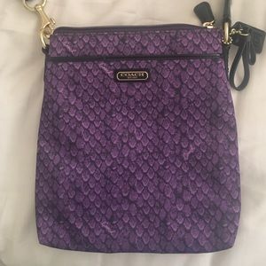 NWOT authentic Purple Snake Coach Swingpack