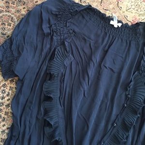 Thin cardigan with ruffles .