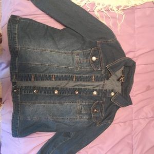I'm selling a dark blue jean jacket.