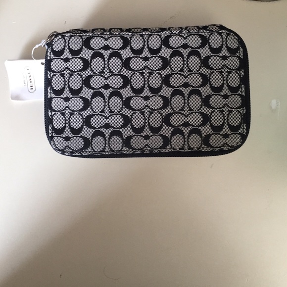 Coach travel jewelry case.