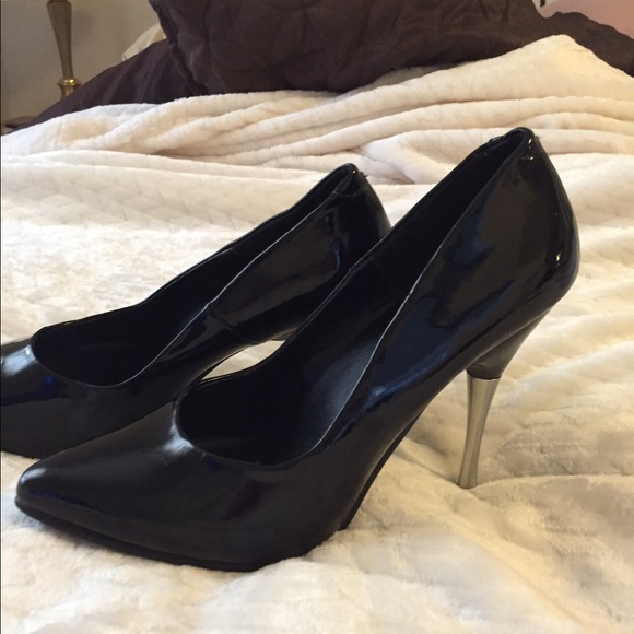 Patent leather metal heel pumps.