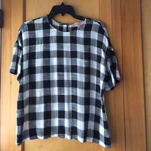 Black and white plaid top.