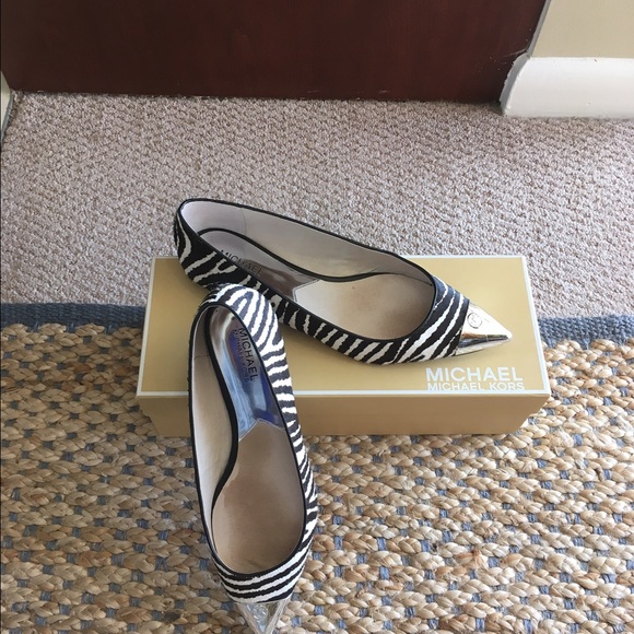 Michael Kors zebra pattern faux hair and leather.