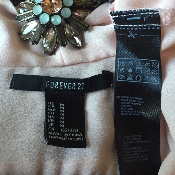 Sleeveless blouse - Picture 3 of 3