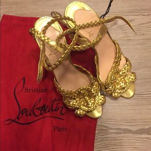 Christian Louboutin gold heels