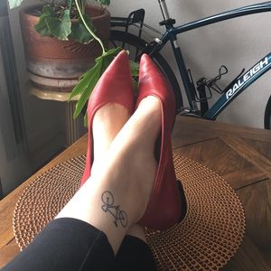 Pointy red flats