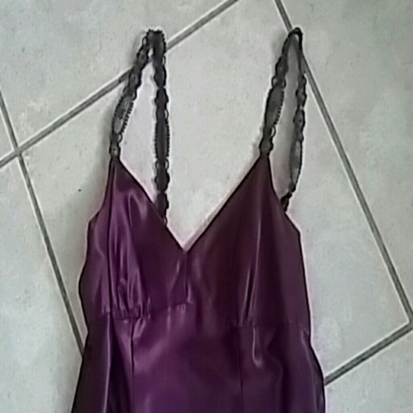 Form-fitting super slick Satin formal dress.