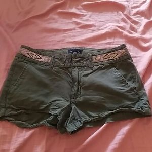 Green embroidered shorts