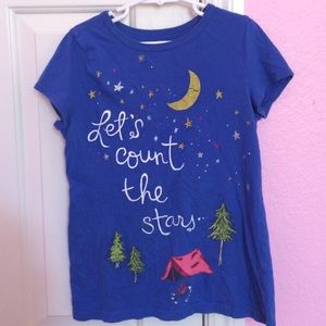 Blue short sleeved top.