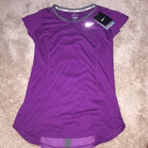 Purple Nike athletic tee shirt