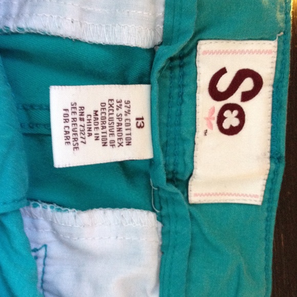 Short teal shorts. - Picture 2 of 3