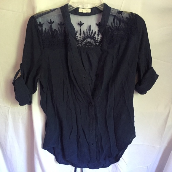 Navy blue blouse with lace cutouts