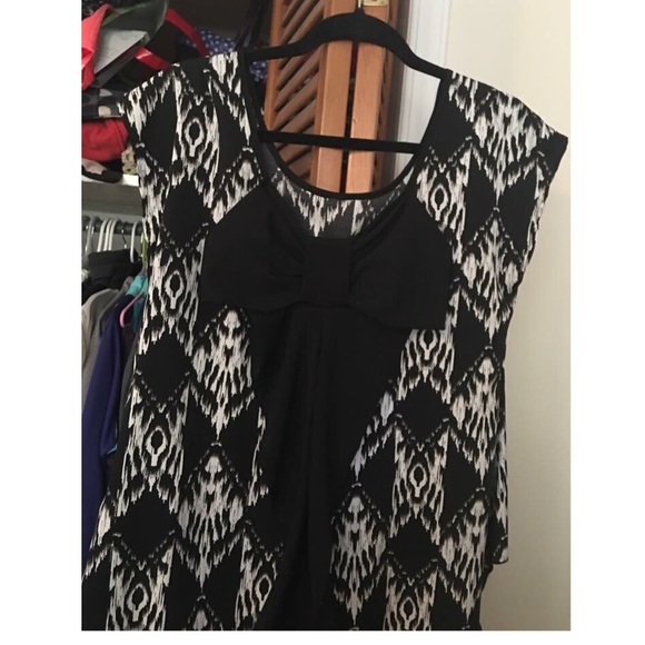 This is the back of the shirt. Big black bow.