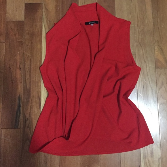 Red sleeveless wrap blouse