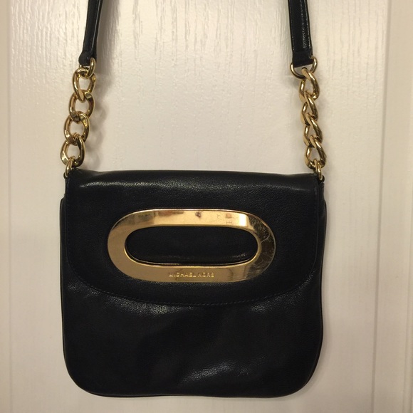 Michael Kors black cross body with gold accents